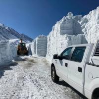 Clearing snow from a closed roadway